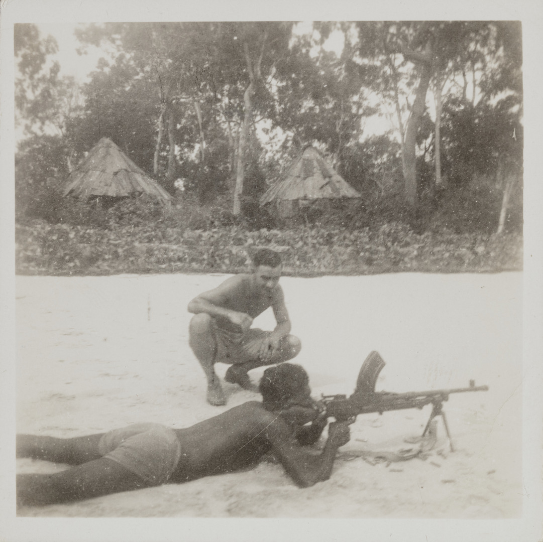Territory Stories - A soldier training an Aboriginal man how to use a ...